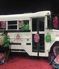 Alpha Kappa Alpha Sorority, Incorporated, Xi Alpha Omega Chapter's One Million Backpacks Committee Chairman, Ava Logans Clark, delivering backpacks to Alpha Kappa Alpha Sorority, Incorporated, South Central Regional Conference in Shreveport LA