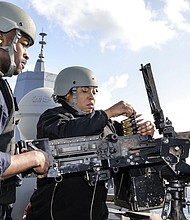 Fire Controlman 2nd Class Dana Green and Fire Controlman 3rd Class Darion Callies,