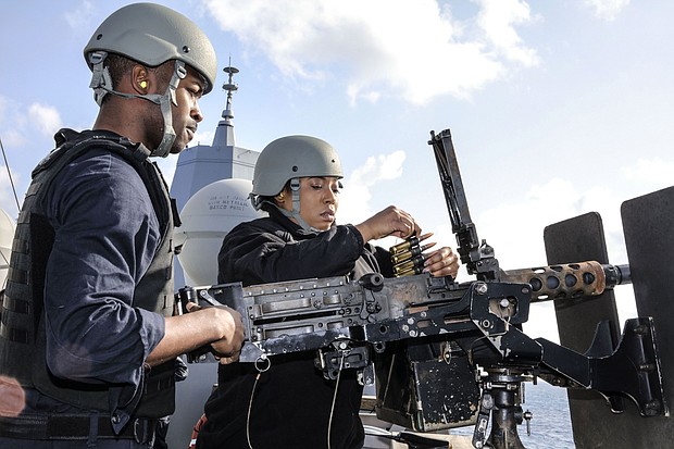 Fire Controlman 2nd Class Dana Green and Fire Controlman 3rd Class Darion Callies,