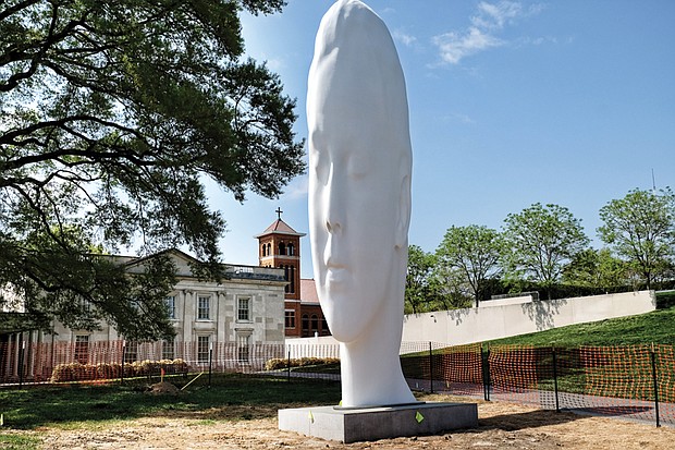 Call it the new face of the Virginia Museum of Fine Arts. The dramatic 24-foot head now dominates the sculpture garden at the public art museum on the Boulevard. Titled “Chloe,” the sculpture is the creation of Spanish artist Jaume Plensa, who will be at the museum Thursday, April 27, for the dedication. The museum commissioned the contemplative work that is made of polyester resin and marble dust placed over a stainless-steel frame. “Chloe” is one of a series of heads that Mr. Plensa has created for museums in the United States and overseas, and defines the VMFA’s ambitions to commission national and international artists to provide new works for the nearly 4-acre E. Claiborne and Lora Robins Sculpture Garden. 