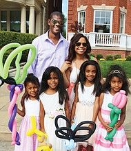 See and be seen  at Easter on Parade // Tillman and Cassie Breckenridge of Midlothian enjoy the day with their four daughters, from left, Paige, 4, Brynn, 5, Reese, 8, and Avery, 5. 
