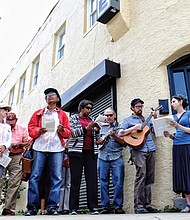 Stations of the Cross // At each of the 14 stops along the route, the group of nearly two dozen people stopped to sing and pray for victims of violence and abuse in the Richmond area, all those involved with the criminal justice system and for state, local and regional government officials.  
