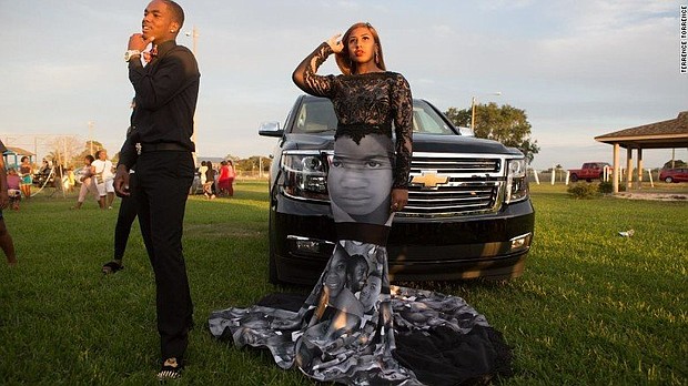 	Milan Bolden-Morris wore a dress featuring pictures of Trayvon Martin, Sandra Bland, Michael Brown, and others to her high school prom.
/Credit:	Terrence Torrence