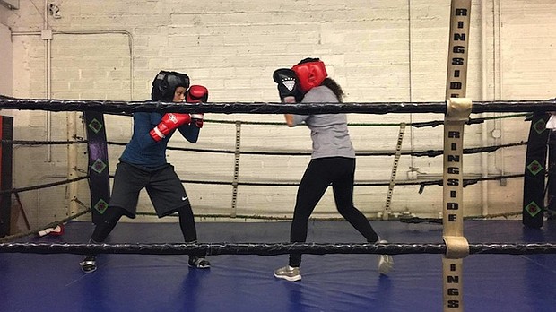 Amaiya Zafar (left), 16, started boxing three years ago and is already making waves in the boxing community. Not only is the Minnesota teen competing in a male-dominated sport, but she's also a devout Muslim.