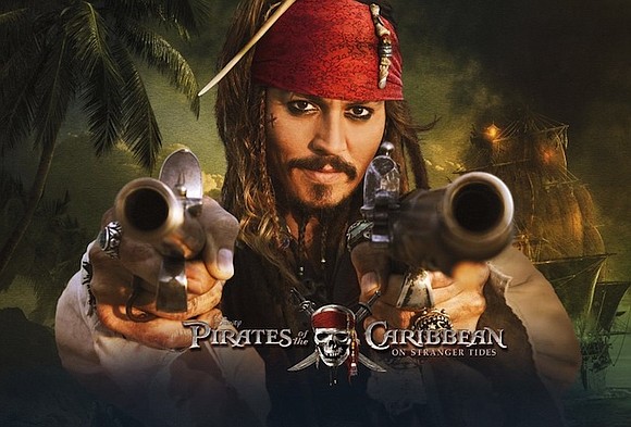 Johnny Depp surprised fans at Disneyland, by popping up on the "Pirates of the Caribbean" ride in his full Capt. …