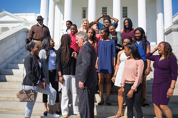 Executive congratulations //
Gov. Terry McAuliffe chats about the Virginia Union University Lady Panthers’ winning formula during the Elite Eight team’s visit last week to the State Capitol. The governor invited the basketball standouts to the Capitol to congratulate them on a winning season. The team went all the way to this year’s NCAA Division II Tournament final, where the Lady Panthers were defeated by Ashland University of Ohio. Coach AnnMarie Gilbert, far right, and the Lady Panthers also toured the Executive Mansion during the April 20 outing. 