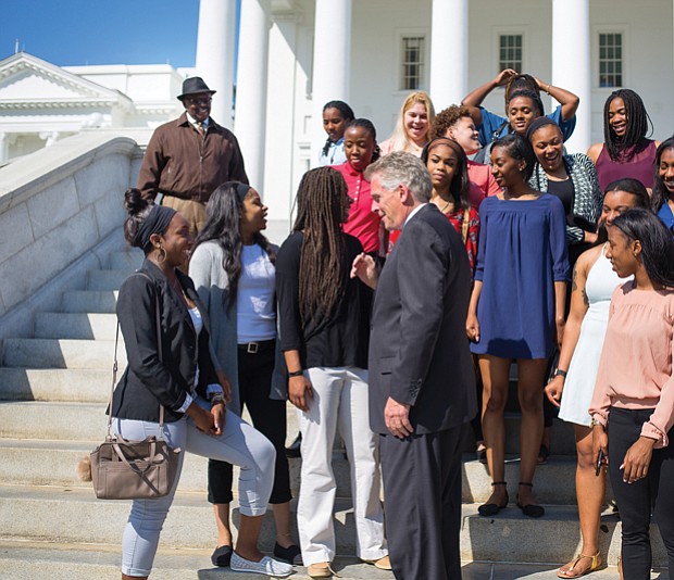 Executive congratulations //
Gov. Terry McAuliffe chats about the Virginia Union University Lady Panthers’ winning formula during the Elite Eight team’s visit last week to the State Capitol. The governor invited the basketball standouts to the Capitol to congratulate them on a winning season. The team went all the way to this year’s NCAA Division II Tournament final, where the Lady Panthers were defeated by Ashland University of Ohio. Coach AnnMarie Gilbert, far right, and the Lady Panthers also toured the Executive Mansion during the April 20 outing. 