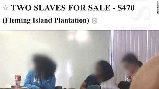 A high school student in Florida has been suspended after taking a photo of two female classmates without their knowledge and posting it as an ad on Craigslist with the title: "two slaves for sale."
