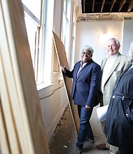 From left, partners Wanda Stallings, Charles E. Ayers Jr. and Margaret Stallings pose on the fourth floor of the St. Luke building, which once held the offices of the Independent Order of St. Luke, an African-American insurance and mutual society, and the St. Luke Penny Savings Bank that Maggie Walker founded in 1903 during her tenure as leader of the organization.   