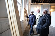 From left, partners Wanda Stallings, Charles E. Ayers Jr. and Margaret Stallings pose on the fourth floor of the St. Luke building, which once held the offices of the Independent Order of St. Luke, an African-American insurance and mutual society, and the St. Luke Penny Savings Bank that Maggie Walker founded in 1903 during her tenure as leader of the organization.   