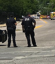 A gunman opened fire on an emergency medical technician vehicle, critically injuring a paramedic with the Dallas Fire-Rescue Department on Monday, according to a statement from the city's police department.