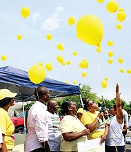 For the missing //
Yellow balloons are released to remember nearly three dozen people from the Richmond area who have been reported missing and whose whereabouts are unknown. The release came at the first “Bring Our Missing Children Home” event hosted last Saturday by the mother of a 21-year-old who has disappeared without a trace. Location: New Life Deliverance Tabernacle in South Side.