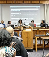 School Board members discuss the process to find a new superintendent during Monday night’s packed meeting at Richmond City Hall.