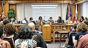 School Board members discuss the process to find a new superintendent during Monday night’s packed meeting at Richmond City Hall.