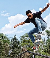 Freewheeling //
Jonathan Parham defies gravity on his skateboard as he gets a jump on a rail at Fonticello-Carter Jones Park at 28th and Bainbridge streets in South Side. 