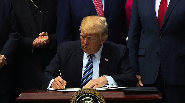 Donald Trump signs legislation