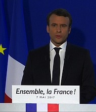 Marine Le Pen loses presidential election in France to centrist Emmanuel Macron