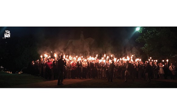 Protests reminiscent of Ku Klux Klan rallies are rattling Charlottesville over the city’s plans to remove a statue of Confederate ...