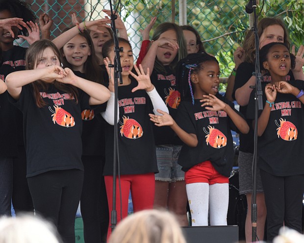 Strawberry Street Festival //
Youngsters from Richmond’s William Fox Elementary School perform during the 38th Annual Strawberry Street Festival last Saturday. The event featured games, rides, raffles, auctions and, of course, strawberries. Proceeds from the festival benefit the school.