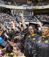 Newly minted nurses celebrate receiving their degrees during the Virginia Commonwealth University commencement Saturday at the Richmond Coliseum.