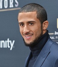 Colin Kaepernick (photo via Getty Images)