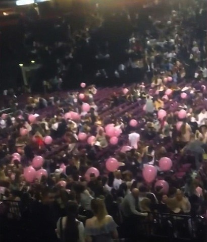 Police in Manchester, England, warned people to stay away from Manchester Arena after reports of two loud explosions during an Ariana Grande concert Monday night on May 22, 2017. People are seen here moving out of the arena.