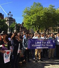 Muslim youth show support for Manchester Arena attack victims at the Baitul Futuh Mosque in London on May 23, 2017.