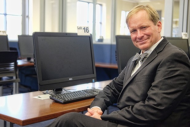 Scott Firestine, director of the Richmond Public Library, sits in one of the smaller computer labs available to the public in the library’s Main Branch at 101 E. Franklin St. in Downtown. Patrons can use the computer lab to access the library’s expanded array of digital materials.