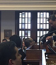 Texas House Speaker Joe Straus congratulates Chairman Coleman on passage of the Sandra Bland Act on May 19, 2017.