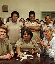 	Members of the cast of Netflix's "Orange is the New Black" appear in this photograph.

