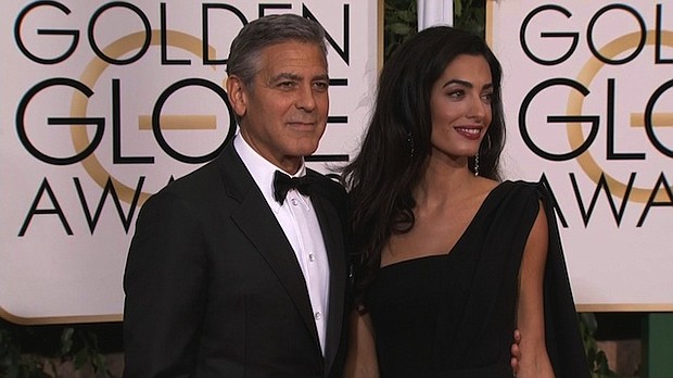 	George Clooney and his wife, Amal Clooney