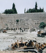 Several days after entering the Old City of Jerusalem in the Six-Day War in 1967, Israel cleared the most sacred Jewish place, the Western Wall of the Temple.