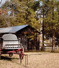 A wagon donated to the historical site in Goochland County sits outside the third and last Jackson Blacksmith Shop that was built in 1932. The original shop was constructed by Henry Jackson in 1880.