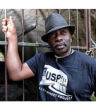 Sir James Thornhill stands at the end of the pedestrian tunnel in Battery Park where he will create murals honoring tennis star Arthur Ashe. The tunnel connects a basketball court to the tennis courts where Mr. Ashe practiced early in his career.