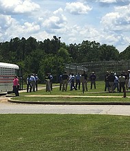 Two prisoners escaped and killed two corrections officers that were transporting them on a bus in central Georgia on June 13, 2017, according to authorities.