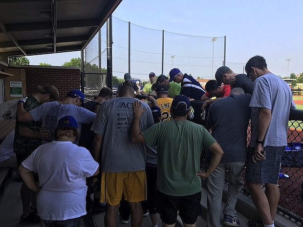 Rep. Kihuen tweeted this photo out with the following caption. .@HouseDemocrats praying for our @HouseGOP @SenateGOP baseball colleagues after hearing about the horrific shooting. CLEARED: All platforms/affils COURTESY: Rep. Ruben J. Kihuen LOCATION: Alexandria, Virginia PHOTO: https://twitter.com/RepKihuen/status/874961886722363393