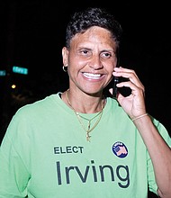 Antionette Irving steps outside her election party Tuesday night to call her mother and share the news that she won the Democratic primary for Richmond sheriff. Her watch party at Cary 100 Restaurant & Lounge in Downtown turned into a victory party.