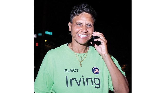 Antionette Irving steps outside her election party Tuesday night to call her mother and share the news that she won the Democratic primary for Richmond sheriff. Her watch party at Cary 100 Restaurant & Lounge in Downtown turned into a victory party.