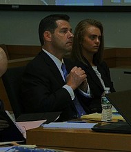 	Michelle Carter (seated right) is on trial for allegedly encouraging her boyfriend to commit suicide.
