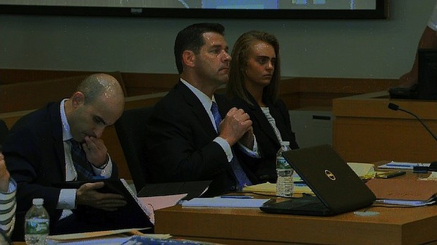 	Michelle Carter (seated right) is on trial for allegedly encouraging her boyfriend to commit suicide.

