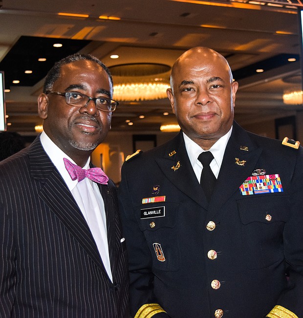 Brigadier General Ural Glanville congratulates Marvin Dickerson, the national President of the 100 Black Men of America, and Inc. on their 60th National Convention. General Glanville said “We are here (U.S. Army) because the Army shares the same mission as the 100 Black Men of America. Preparing our youth to be the next generation of leaders. Personally, I enjoy mentoring young people and what I see here is an organization that cares about the youth and values education.”