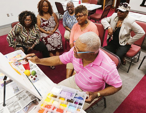 Regina H. Boone/Richmond Free Press
Spiritual practice
Veteran Virginia State University art educator and artist Eugene R. Vango of Petersburg demonstrates the basics of portrait still life painting with Footlights, a spiritually based program for women military veterans from Richmond’s Hunter Holmes McGuire Veterans Administration Medical Center. They are, from left, Renette Rawlings, Kimberly Winn, Felicia Moore, Cheryl Moses and Dianne Butts. Led by chaplain Brenda Phillips, the vets were investigating painting as a spiritual practice during a field trip with Mr. Vango at the L. Douglas Wilder Library and Learning Resource Center at Virginia Union University. It was the culminating activity of Footlights’ 10-week session. Another session begins Sept. 14. 