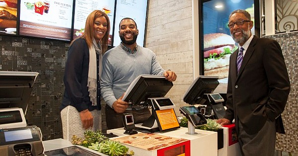 Reginald Webb and his children, who are also owners of their own McDonald's Franchises