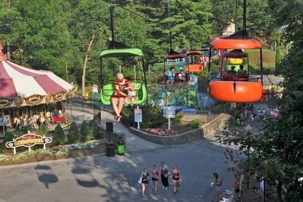 A 14-year-old girl was injured when she dropped from a ride Saturday night at a Six Flags amusement park in upstate New York, the sheriff's office said.