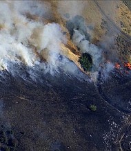 In Utah, fires continued with little rain relief in sight. Ten communities have been evacuated, officials said.