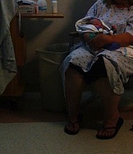 	Debbie rocks her grandson, gently cradling the newborn in the specialized neonatal unit at Cabell Huntington Hospital. When the boy was born in early June, he was going through opioid withdrawal