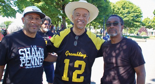 Community leaders Tony Hopson, Ron Herndon and Jerry Lawrence show their support for Good in the Hood. The 25th annual event was under tight security over the weekend after threats of racist violence, but thankfully none materialized.