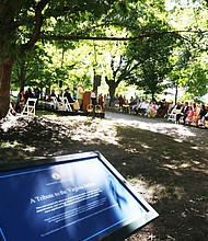 Blessing the grounds //
Hundreds of people gather at Capitol Square in Downtown last Saturday for the groundbreaking for the Native American monument. Speakers included Alan Michelson, a Mohawk, whose design, “Mantle,” was chosen for the monument, and Olympic gold medalist Billy Mills, below left, a member of the Oglala Lakota tribe. 