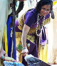 Blessing the grounds //The ceremony included a blessing of the grounds with the Virginia Indian Dancers and the Turtle Clan Drummers. Dr. Denise Walters, left, of Henrico County, a member of the Nottoway Tribe, participates in the blessing, while other members of the tribe