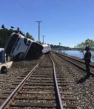 An Amtrak train derailed in Tacoma, Washington, Sunday afternoon. Authorities say four cars derailed, minor injuries.